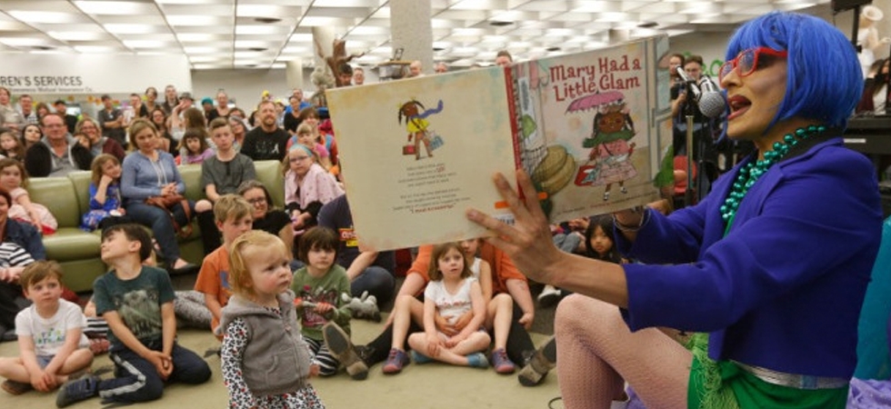 Drag queen reads the storybook ‘Mary Had A Little Glam’ to children at the South Hill Public Library in Spokane, Washington, on Saturday, June 15, 2019. 